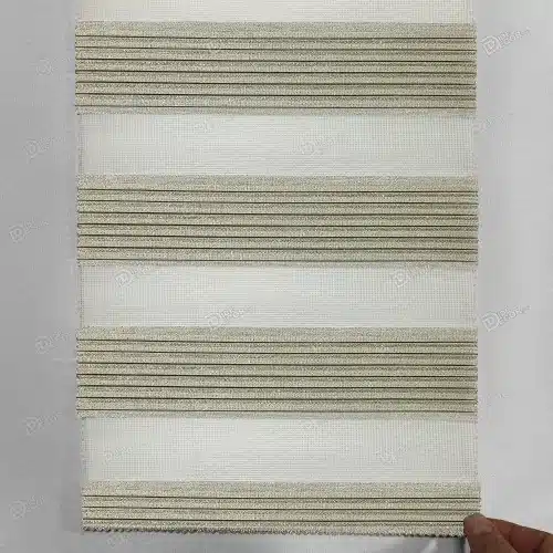 نمونه پارچه پرده زبرا پلیسه دار ریز کد T2530، رنگ طلایی با لمه براق طلایی، مناسب برای هماهنگی با دکوراسیون منزل یا محل کار.